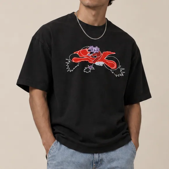 Close view of the black G5 Bike Slide shirt and its motion-inspired print